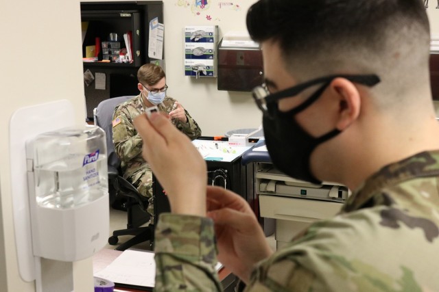 Prepping doses in the immunization room