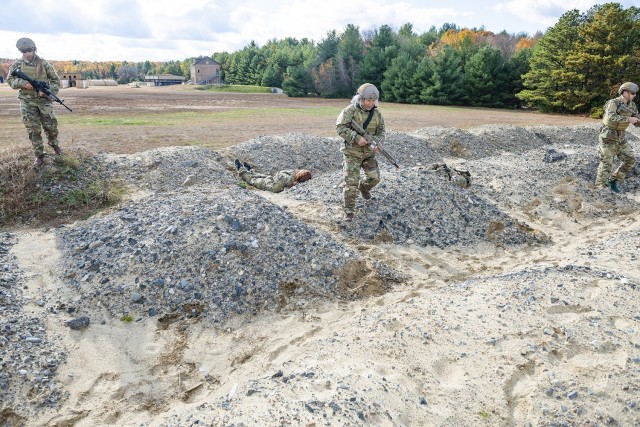 Civilian employees from the U.S. Army Combat Capabilities Development Command Soldier Center conduct movement to contact and casualty evacuation drills in the field as part of the center’s Greening training held November 1-5, 2021 at Fort Devens, Massachusetts.