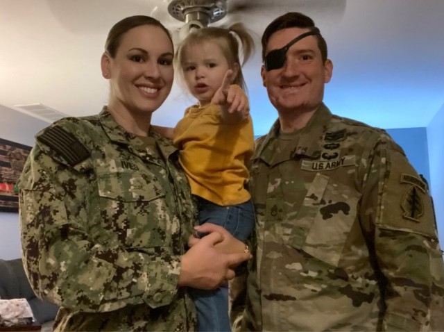 U.S. Navy Reserve Chief Petty Officer Rebecca Ives and U.S. Army Staff Sgt. Ian Ives with their daughter, Olivia. (Courtesy photo provided by Rebecca Ives)