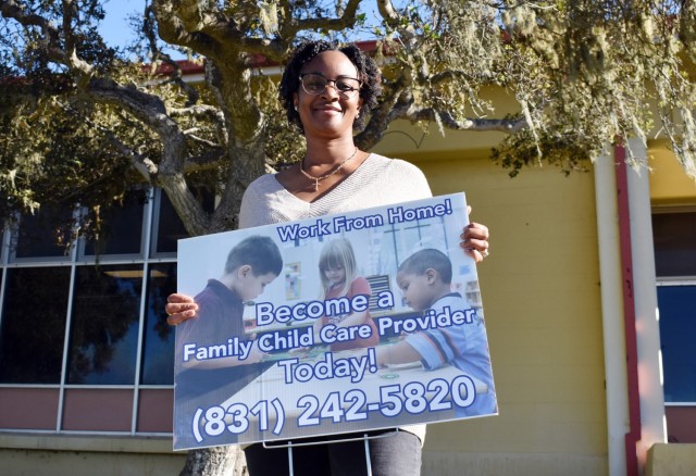 LaToya Maben, outreach director and Family Child Care director for Child and Youth Services, U.S. Army Garrison Presidio of Monterey, poses for a photo at PoM CYS headquarters, Bldg. 4260, Ord Military Community, Calif., Nov. 22.