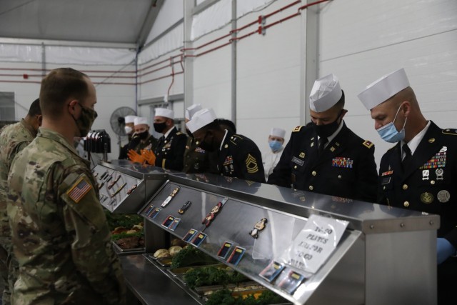 The Hunter Army Airfield Warrior Restaurant serves a World of Games themed Thanksgiving lunch on Hunter Army Airfield, Georgia, November 22, 2021. The dining facility’s meal was used to provide a taste of home to Soldiers and Families that may...