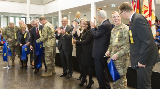 Representatives with Europe District, U.S. Army Corps of Engineers, celebrated the grand opening of the Department of Defense Education Activity’s first 21st-century high school worldwide – Wiesbaden High School -- with DoDEA-Europe,...