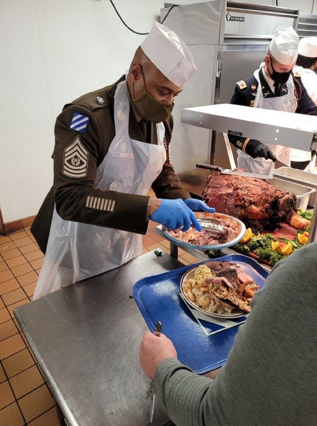 U.S. Army Command Sgt. Maj. Quentin Fenderson, the senior enlisted advisor of the 3rd Infantry Division serves Soldiers at the Marne Bistro’s Thanksgiving luncheon at Fort Stewart, Georgia, Nov. 23, 2021. Leaders from across the 3rd ID came...