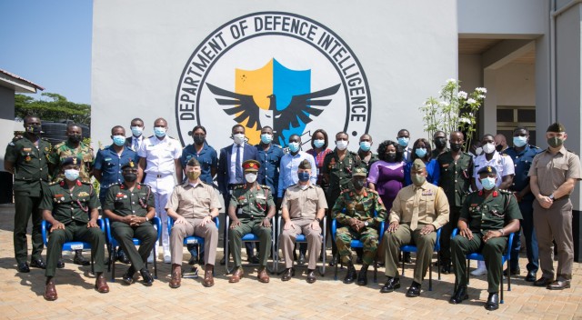 U.S. Army Gen. Christopher Cavoli (fourth from right, front row) joins Ghana Chief of Defense Intelligence Brig. Gen. Abraham Yeboah Nsiah (center) and other members of Ghana’s Department of Defense Intelligence in Accra, Ghana, Nov. 16., 2021. Cavoli, commanding general of U.S. Army Europe and Africa, visited Ghana to meet with senior defense officials of the W. Africa country. (Photo courtesy U.S. Embassy Accra.)