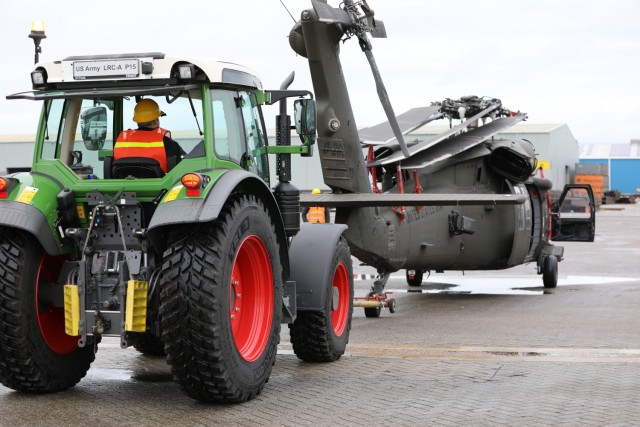 1st ACB tows their equipment off the Endurance Vessel in preparation to change it from travel mode to operational mode. Allowing it to be fully mission capable and ready to support in Operation Atlantic Resolve.