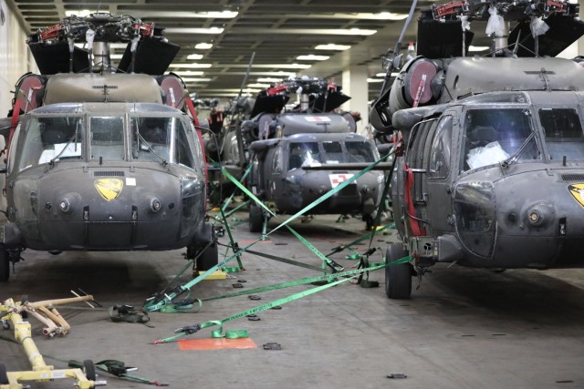 1st Air Calvary Brigade Helicopters are strapped to the Endurance Vessel, ready to be unhooked and unloaded. These will be utilized in the the 9 month rotation in support of Operation Atlantic Resolve.