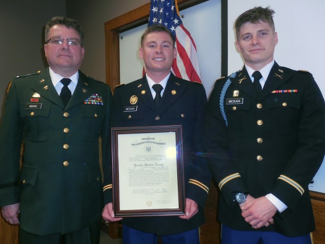 Pictured from left to right, retired Chief Warrant Officer 4 Roman Meduga Jr., 2nd Lt. Roman Meduga III, and 1Lt. Julian Meduga pose for a group photo on the occasion of Lt. Roman Meduga’s U.S. Army commissioning in May 2016.