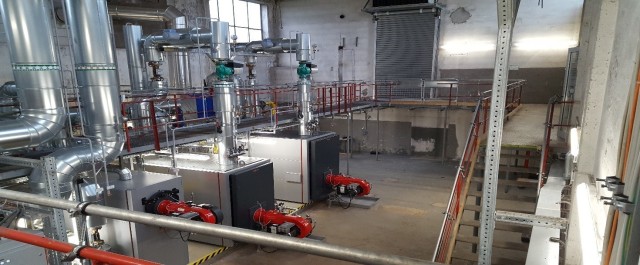 The new equipment inside the heating plant features combined gas and electric for improved performance.