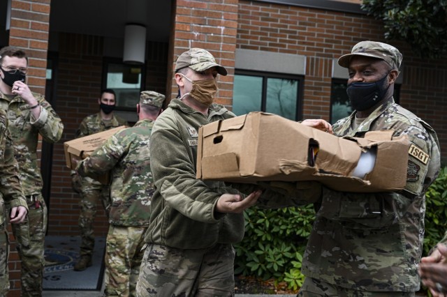 U.S. Air Force Airmen with Team McChord help distribute turkeys during Operation Turkey Drop at Joint Base Lewis-McChord, Wash., Nov. 18, 2021. The Air Force Association McChord Field Chapter and the Pierce Military and Business Alliance organized...