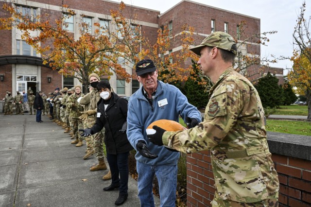 U.S. Air Force Airmen with Team McChord and volunteers from the local community help distribute turkeys during Operation Turkey Drop at Joint Base Lewis-McChord, Wash., Nov. 18, 2021. The Air Force Association McChord Field Chapter and the Pierce...