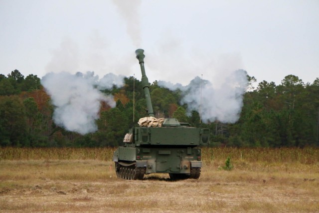 A modernized Paladin M109A7 howitzer, assigned to the “BattleKings Battalion,” 1st Battalion, 9th Field Artillery Regiment, 2nd Armor Brigade Combat Team, 3rd Infantry Division, conduct a high angle fire mission during artillery Table VI section level qualifications as part of the culminating exercise in operator new equipment training at Fort Stewart, Georgia, Nov. 5, 2021. The “Spartan Brigade,” 2nd ABCT, 3rd ID, is the tip of the spear in the Division’s glide path to become the most modernized division in the U.S. Army by summer 2023. (U.S. Army photo by Sgt. Trenton Lowery)