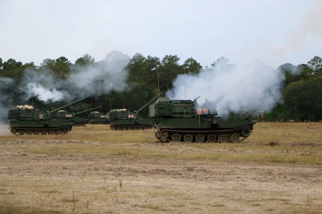 Modernized Paladin M109A7 howitzers, assigned to the “BattleKings Battalion,” 1st Battalion, 9th Field Artillery Regiment, 2nd Armor Brigade Combat Team, 3rd Infantry Division, conduct sequence firing during artillery Table VI section level qualifications as part of the culminating exercise in operator new equipment training at Fort Stewart, Georgia, Nov. 5, 2021. The “Spartan Brigade,” 2nd ABCT, 3rd ID, is the tip of the spear in the Division’s glide path to become the most modernized division in the U.S. Army by summer 2023. (U.S. Army photo by Sgt. Trenton Lowery)