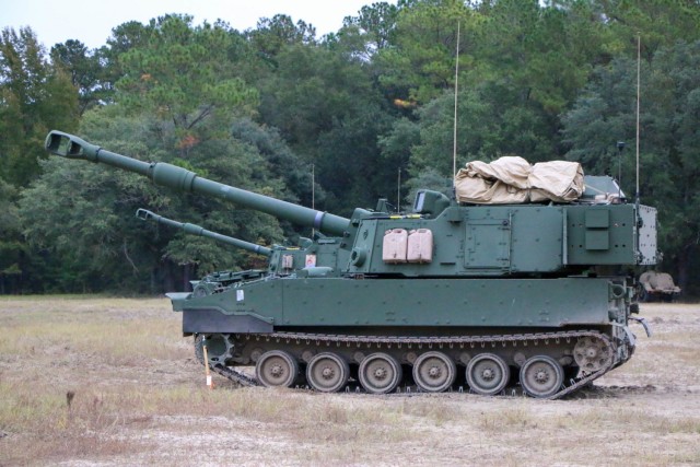 Modernized Paladin M109A7 howitzers, assigned to the “BattleKings Battalion,” 1st Battalion, 9th Field Artillery Regiment, 2nd Armor Brigade Combat Team, 3rd Infantry Division, prepare to fire for the first time during artillery Table VI section level qualifications as part of the culminating exercise in operator new equipment training at Fort Stewart, Georgia, Nov. 07, 2021. The "Spartan Brigade," 2nd ABCT, 3rd ID, is the tip of the spear in the Division’s glide path to become the most modernized division in the U.S. Army by summer 2023. (U.S. Army photo by Sgt. Trenton Lowery)