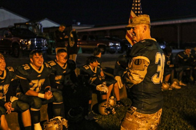 General Paul Funk II addresses the Fort Knox Middle/High School football team before the final game of the season October 29. The Fort Knox Eagles honored Funk, commanding general, U.S. Army Training and Doctrine Command, and former Eagle football...