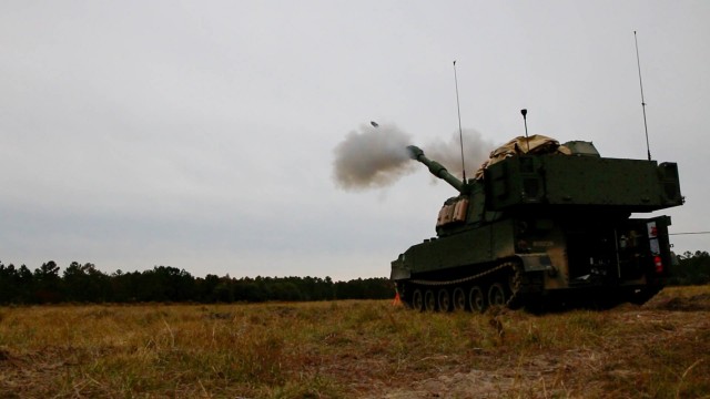 A modernized Paladin M109A7 howitzer, assigned to the “BattleKings Battalion,” 1st Battalion, 9th Field Artillery Regiment, 2nd Armor Brigade Combat Team, 3rd Infantry Division, fires its first 155mm round during artillery Table VI section...