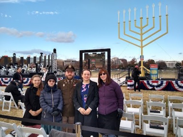 U.S. Army Chaplain Capt. Mendy Stern  and his family prepare for  the start of the annual  National Chanukah Menorah Ceremony on the White House Ellipse, Sunday, Nov. 28, 2021. Every year the ceremony  includes the lighting of one of the world’s largest menorah’s.