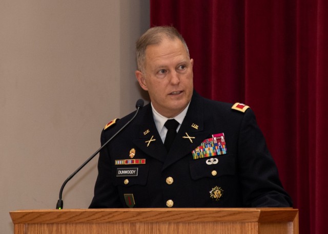 Col. James Dunwoody, Concept Development Division chief, delivers remarks at the bi-monthly retirement ceremony Nov. 19, 2021, in Fort Sill, Oklahoma.  The ceremony paid tribute to 16 soldiers, civilian employees of the Ministry of the Army and their families.  (U.S. Army photo by Maria Baugh)