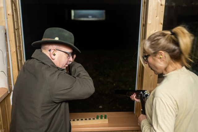 An instructor demonstrates how to hit the &#34;running rabbit&#34; target.
