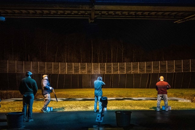 Shooter attempt their best shot against clay targets.