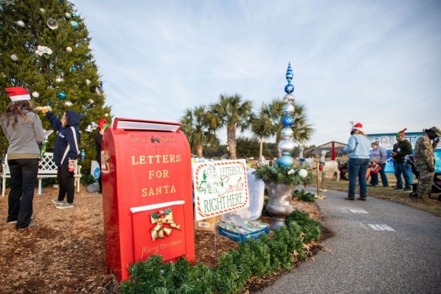In 2020, despite the COVID pandemic, children and parents visited the Fort Jackson annual Holiday Tree Lighting ceremony where they met with Santa.