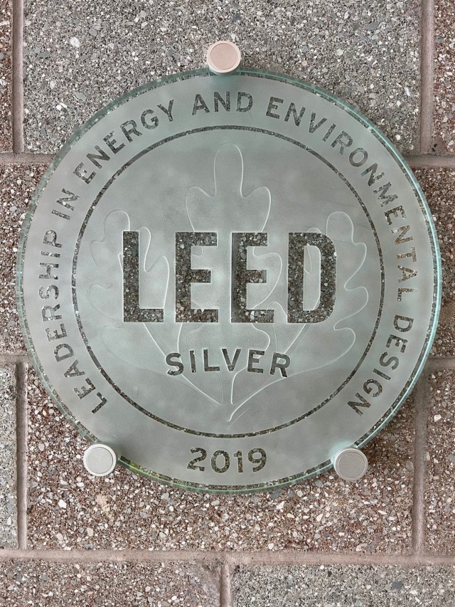 The U.S. Green Building Council’s Leadership in Energy and Environmental Design plaque is displayed in the entryway of the F-35 Flight Simulator Center on Eielson Air Force Base. The U.S. Army Corps of Engineers – Alaska District constructs military facilities to meet the standards of the program at the silver level using sustainable construction practices.