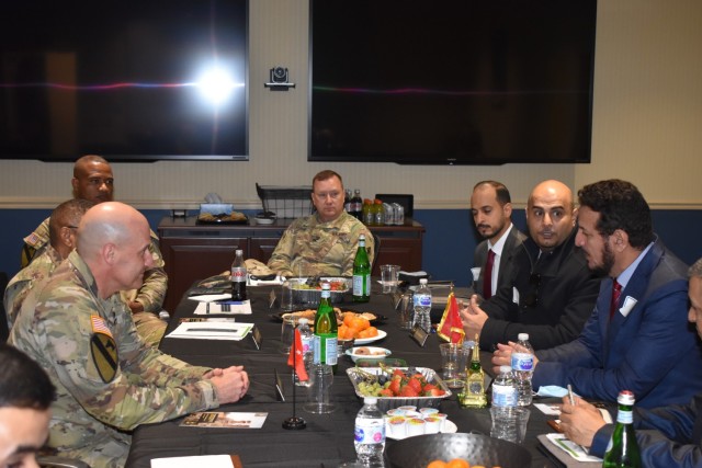 Fort Jackson Commanding General, Brig. Gen. Patrick Michaelis meets with Maj. Gen. Musfer Hassan M. Alqahtani and the Saudi Arabian delegation over a meal at the Chaplain School Nov. 29. (By Mel Slater)