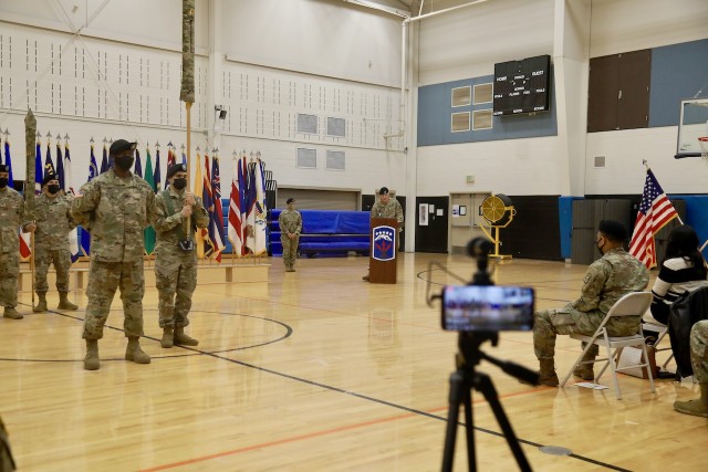 The 53rd Transportation Battalion (Movement Control) Commander, Lt. Col. Aaron Cornett, discusses the battalion&#39;s transition to Joint Base Lewis-McChord from Joint Base Eustis-Langley during an activation ceremony here, Dec. 3, 2021.    

The 53d Movement Control Battalion was first activated May 28, 1943 as Headquarters and Headquarters Detachment, 53d Quartermaster Truck Battalion, and it was activated again in North Africa June 22, 1943.

The battalion served in seven campaigns during World War II, including:
Sicily (with Arrowhead), Naples-Foggia, Anzio (with Arrowhead), Rome- Arno, Southern France (with Arrowhead), Rhineland, and central Europe.

With the advent of the Global War on Terrorism in 2001, the battalion has experienced a near constant rotation of units into and out of the CENTCOM area of responsibility with the headquarters and subordinate units deploying to Afghanistan, Iraq, and Kuwait as part of Operation Enduring Freedom, Iraqi Freedom, and New Dawn.  

Through a multitude of in-activations, re-designations, and re-activations the 53d Transportation Battalion has marched through the decades to its re-organization, Oct. 29, 1999, at Fort McPherson, Georgia, into the 53d Movement Control Battalion. The battalion most recently deployed out of Fort Eustis, Virginia, in support of Atlantic Resolve and the European Deterrence Initiative. 

Now that the mission is complete in support of Atlantic Resolve, the battalion re-stationed in August to Joint Base Lewis- McChord, activating as the Transportation Battalion (Movement Control) and stands ready to provide superior support to America&#39;s First Corps.

(U.S. Army photo by Sgt. 1st Class Tony White, 593rd Expeditionary Sustainment Command)