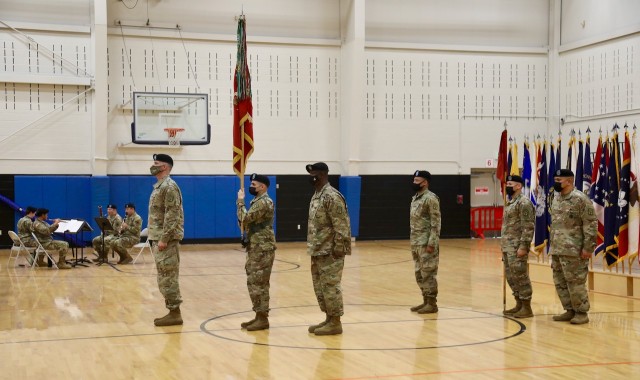 The 53rd Transportation Battalion (Movement Control) command team of Lt. Col. Aaron Cornett and Command Sgt. Maj. LaVaughn Brown uncase the battalion&#39;s colors, signifying the unit&#39;s activation during a ceremony at Joint Base Lewis-McChord, Dec. 3, 2021.  The unit joins the 593rd Expeditionary Sustainment Command after transitioning from Joint Base Eustis-Langley.  

The 53d Movement Control Battalion was first activated May 28, 1943 as Headquarters and Headquarters Detachment, 53d Quartermaster Truck Battalion, and it was activated again in North Africa June 22, 1943.

The battalion served in seven campaigns during World War II, including:
Sicily (with Arrowhead), Naples-Foggia, Anzio (with Arrowhead), Rome- Arno, Southern France (with Arrowhead), Rhineland, and central Europe.

With the advent of the Global War on Terrorism in 2001, the battalion has experienced a near constant rotation of units into and out of the CENTCOM area of responsibility with the headquarters and subordinate units deploying to Afghanistan, Iraq, and Kuwait as part of Operation Enduring Freedom, Iraqi Freedom, and New Dawn.  

Through a multitude of in-activations, re-designations, and re-activations the 53d Transportation Battalion has marched through the decades to its re-organization, Oct. 29, 1999, at Fort McPherson, Georgia, into the 53d Movement Control Battalion. The battalion most recently deployed out of Fort Eustis, Virginia, in support of Atlantic Resolve and the European Deterrence Initiative. 

Now that the mission is complete in support of Atlantic Resolve, the battalion re-stationed in August to Joint Base Lewis- McChord, activating as the Transportation Battalion (Movement Control) and stands ready to provide superior support to America&#39;s First Corps.

(U.S. Army photo by Sgt. 1st Class Tony White, 593rd Expeditionary Sustainment Command)