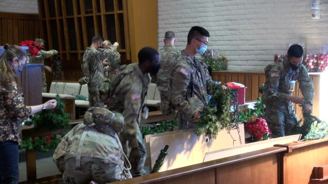 The holiday season got underway at the Main Post Chapel with Hanging of the Green and other holiday traditions.