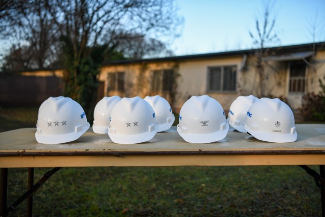 Construction hats are in place for the ceremonial groundbreaking for Vicenza's Army Family Housing construction program in Vicenza, Italy, Dec. 6, 2021. Vicenza's construction program is the Army’s current largest housing investment program valued at $373 million. (U.S. Army photo by Maria Cavins)