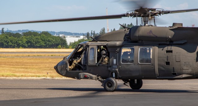 An all-female flight crew assigned to 16th Combat Aviation Brigade, taxis in a UH-60 Black Hawk helicopter at Hillsboro, Ore., on Jul. 29, 2021.  Flight crews comprising of all women are uncommon due to the low number of females in Army aviation. (U.S. Army photo by Capt. Kyle Abraham, 16th Combat Aviation Brigade)