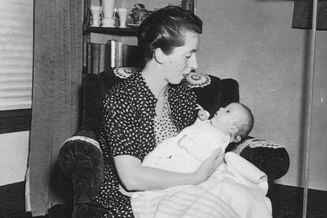 Amney Burpee cuddles her infant son, David, in the weeks after he was born at Hawaii&#39;s Tripler Hospital on Dec. 7, 1941, during the Pearl Harbor attacks.