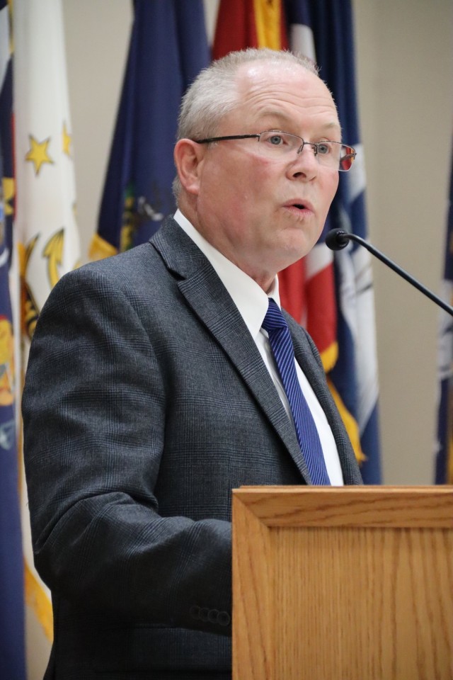 Mike Dodds, chief, education services division, speaks to the graduating students, their family and friends, distinguished guests and the staff of the Harry S. Truman Education Center in his opening remarks Dec. 2, 2021 at the Cache Creek Chapel.