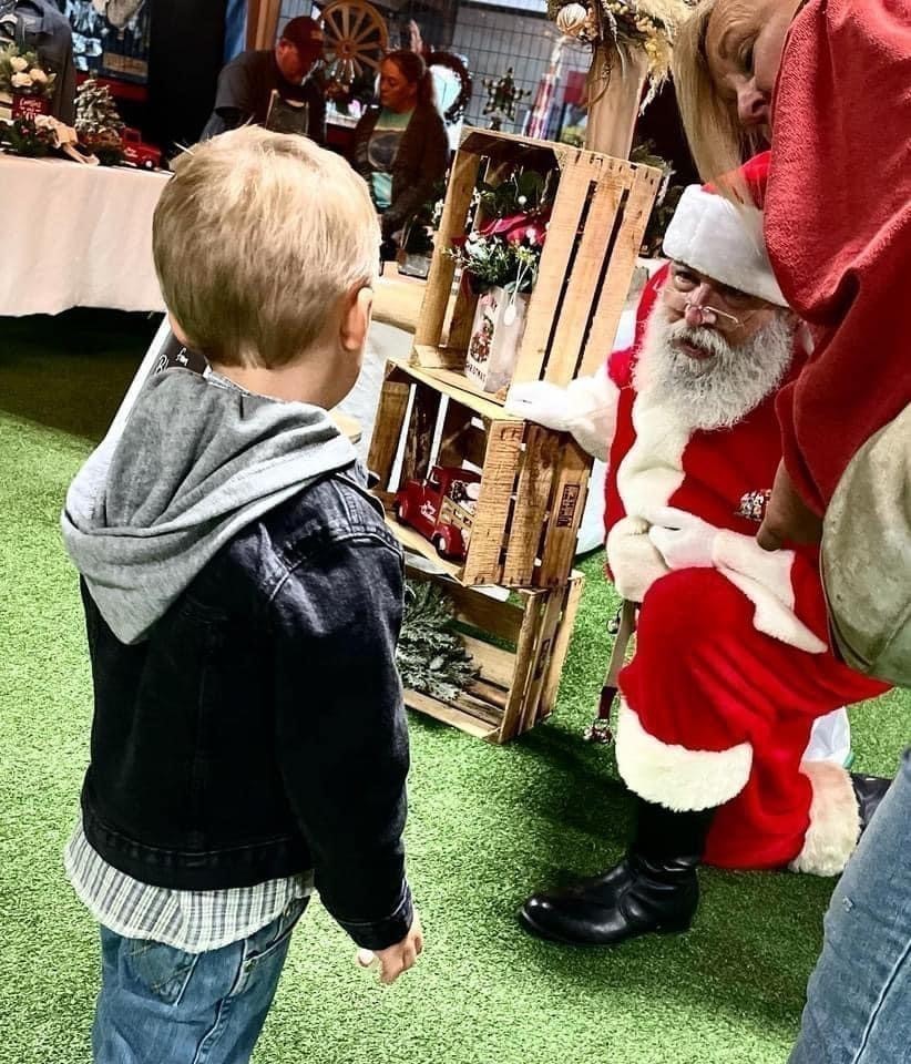 Ho ho ho: Real-life Santas spread Christmas cheer among kids in