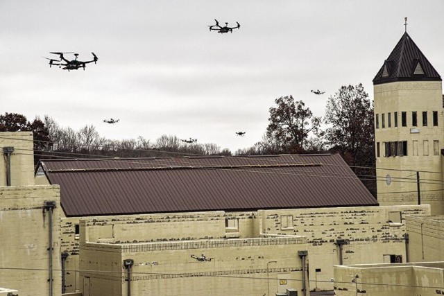 A swarm of drones scans the Cassidy Range Complex at Fort Campbell in a scenario conducted Nov. 16 during the final field experiment for the OFFensive Swarm Enabled Tactics, or OFFSET, program. Researchers with the Defense Advanced Research Projects Agency, or DARPA, designed OFFSET with the goal of allowing infantry units to use swarms with upwards of 250 drones to accomplish diverse mission objectives in urban environments. (U.S. Army photo by Jerry Woller | Fort Campbell DPTMS)