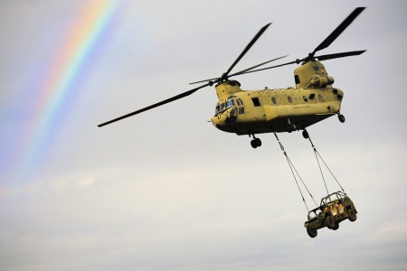 Soldiers conduct sling-load operations with an Army CH-47 Chinook helicopter during a training exercise in Monte Romano, Italy, Jan. 20, 2021. 