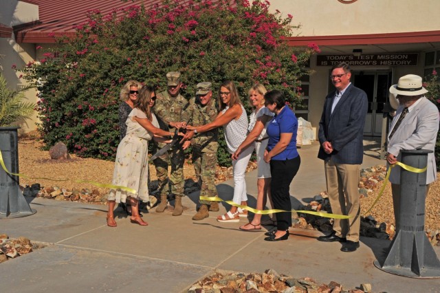 The group which included, (left to right) Heidi McFall, Civilian Aide to the Secretary of the Army Dr. Linda Denno, Command Sgt. Maj. Herbert Gill, YPG Commander Col. Patrick McFall, President/CEO at Greater Yuma Economic Development Corporation Julie Engle, Executive Director of Visit Yuma Linda Morgan, Yuma County Chamber of Commerce Executive Director Kimberly Kahl, Garrison Manager Ronny James and Museum Curator Bill Heidner were all smiles as they cut the ribbon.