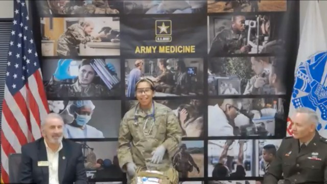 Staff Sgt. Kashina Cavender (Center), 68W Combat Medic, describes her reasons for serving and the benefits of his career choice via zoom to an audience of high school students from over 40 schools across Texas during the U.S. Army Medical Center of Excellence, or MEDCoE, Virtual Career Showcase, December 6, 2021. The recruiting event, titled “Endless Possibilities,” was the first of its kind. The showcase was hosted by Maj. Gen. Dennis LeMaster (far right), MEDCoE Commanding General; Joseph Bray, Civilian Aide to the Secretary of the Army-Texas, South (far left) and Col. LaTonya Jordan, Commander, 5th Recruiting Brigade (not pictured).  