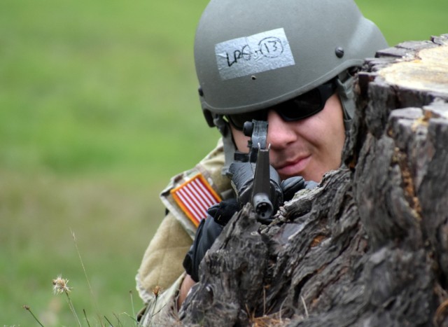 Pfc. Ryan Myrick, assigned to Company C, 229th Military Intelligence Battalion, participates in the battalion’s First Quarter Warrior Tasks and Battle Drills Competition at the Presidio of Monterey, Calif., Dec. 4.