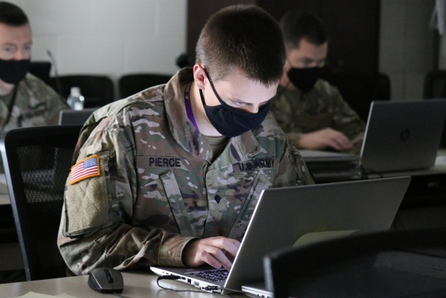 Spc. Alexander Pierce of the Army Cyber Protection Brigade, takes part in Cyber Spartan 5, at Fort Gordon, Ga., Dec. 9, 2021. The event, an inter-unit cyber competition led by the British Army's 13th Signal Regiment, virtually brings together British and allied cyber teams in a competition designed to develop cyber knowledge and skills and identify cyber talent. (Photo by Maj. Lindsay Roman)