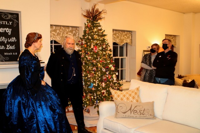 Col. Benjamin Grierson and his wife Alice (Frank Siltman and his wife Lori) talk about the Fires Center of Excellence and Fort Sill commanding general’s residence, Sherman House, during the Candlelight Stroll Dec. 5, 2021.