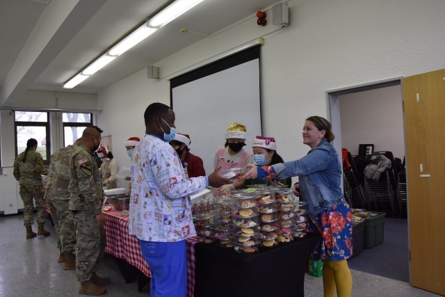 The Wiesbaden Community Spouses Club hands out cookies in support of single Soldiers at the Clay Kaserne Chapel Dec. 7, 2021.