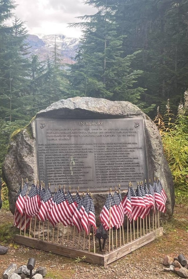 A memorial monument sits at Round Pass on Mount Rainier with its back to the South Tahoma Glacier. The monument bears the names of 32 U.S. Marines who died in a plane crash on Mount Rainier Dec. 10, 1946. 