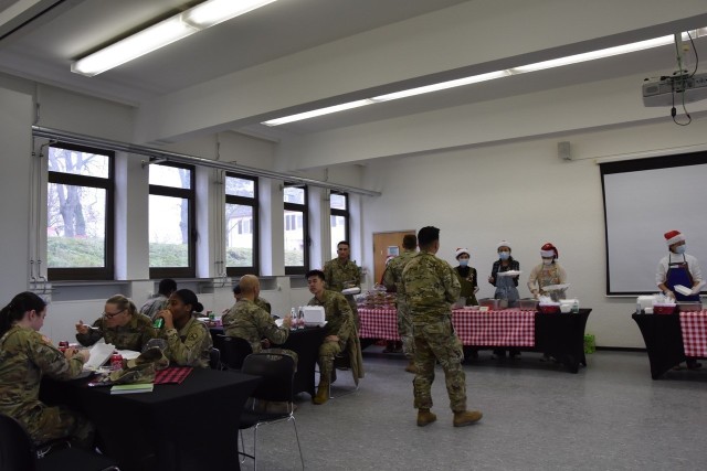 The Wiesbaden Community Spouses Club hands out cookies in support of single Soldiers at the Clay Kaserne Chapel Dec. 7, 2021.