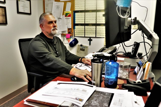 Installation Occupational Health and Safety Specialist Dale Marsolek works at his desk Dec. 9, 2021, at Fort McCoy, Wis. Marsolek is one of two safety specialists at the Fort McCoy Installation Safety Office. The office oversees multiple safety...