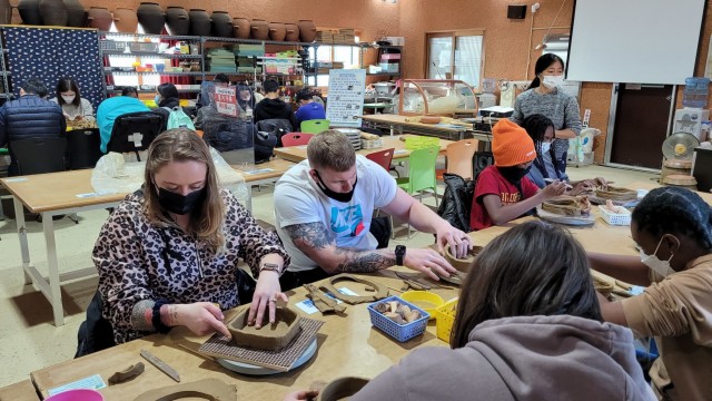 U.S. Army Garrison Humphreys Soldiers and Family members make plates out of clay at the Pottery Exhibition Hall during a tour of Asan City Dec. 4, 2021. The event aimed to foster ready and resilient teams and strengthen the ROK-U.S. alliance through a friendship opportunity with the Good Neighbor Program of Asan.