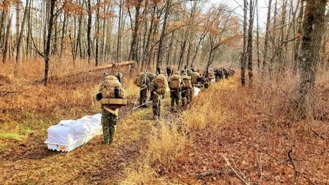 Marines with the 6th Marine Division of Camp Lejeune, N.C., participate in training Dec. 1, 2021, in the Cold-Weather Operations Course (CWOC) Class 22-01 at Fort McCoy, Wis. More than 150 Marines participated in the course that was temporarily...