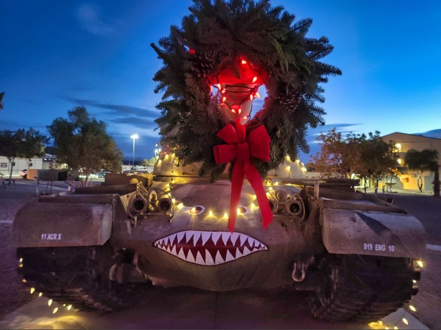A historical 11th Armored Cavalry Regiment vehicle decorated for the season in Wickam Park, Fort Irwin, Calif., on December 8, 2021. Wickam Park is one of the locations in the Regiment's footprint that are dedicated to the preservation of history.