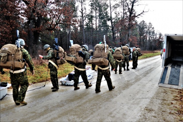 Marines with the 6th Marine Regiment of Camp Lejeune, N.C., participate in training Dec. 1, 2021, in the Cold-Weather Operations Course (CWOC) Class 22-01 at Fort McCoy, Wis. More than 150 Marines participated in the course that was temporarily...