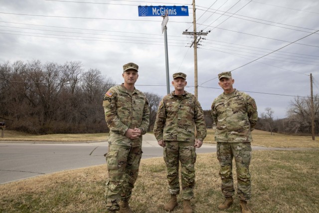 Command Sgt. Maj. Christopher L. Mullinax, left, the command sergeant major of the 1st Infantry Division, Command Sgt. Maj. Todd Sims, middle, the command sergeant major of the U.S. Forces Command, and Maj. Gen. D.A. Sims, right, the commanding...